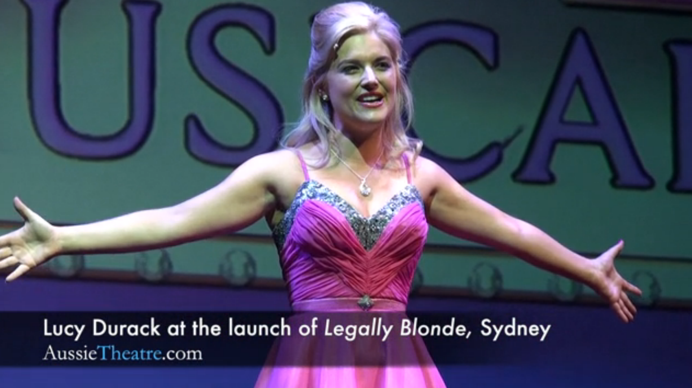 Lucy Durak as Elle Woods In Legally Blonde